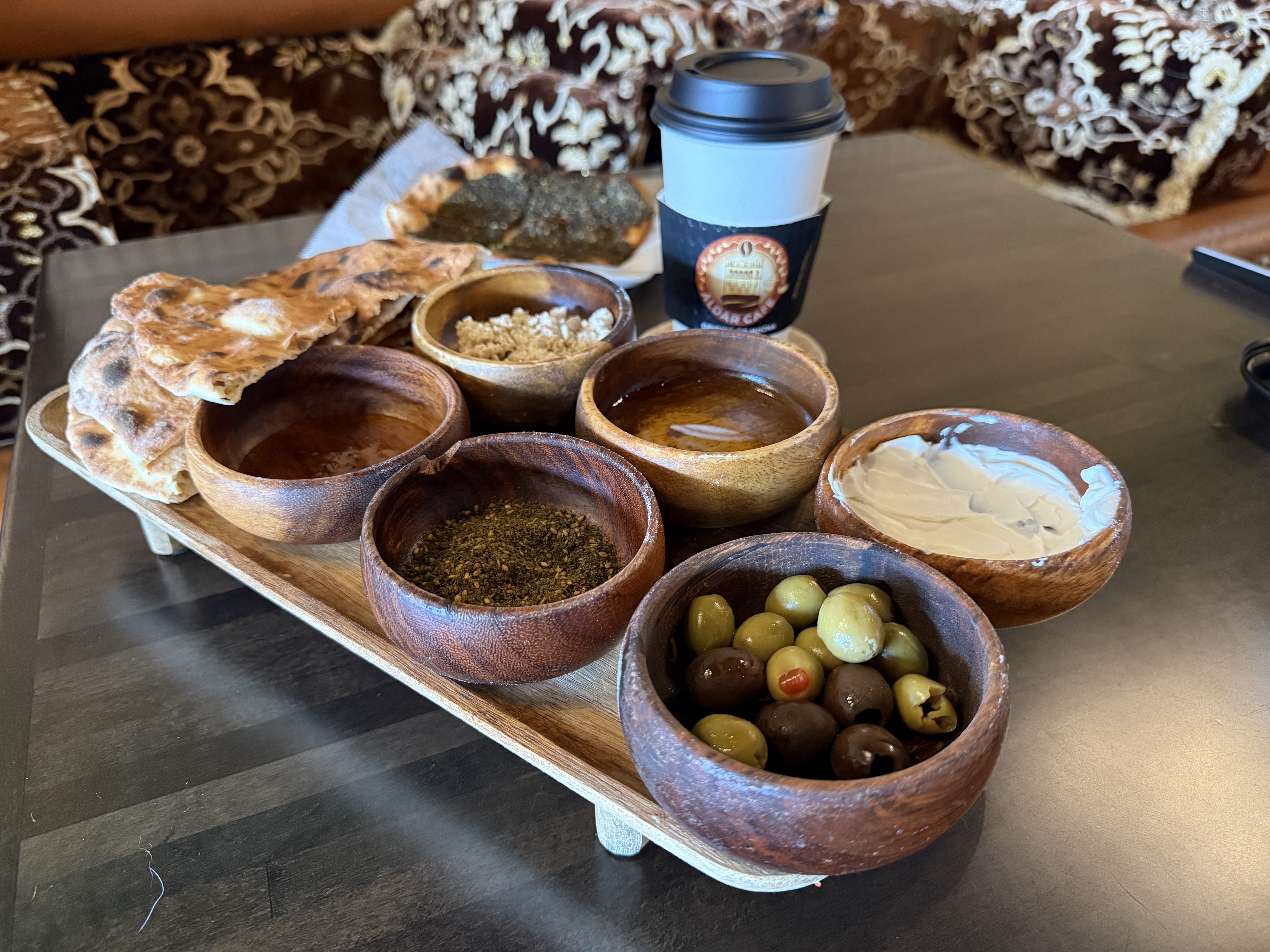 all day arabic breakfast tray with olives, tortillas, honey, olive oil