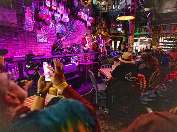 band performs on stage during IBC at Rum Boogie