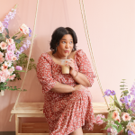 photo of Kim Thomas sipping on a latte