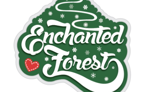 green tree with white lettering inside that says "Enchanted Forest" in Cursive Writing