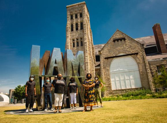 tour group standing in from of Clayborn Temple and I AM A MAN Plaza