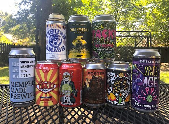 stack of local Memphis beer cans on a table