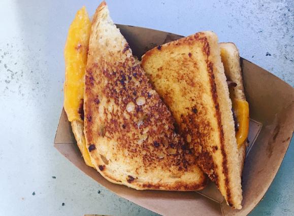 grilled cheese sandwich from Fuel Food Truck, cut in two