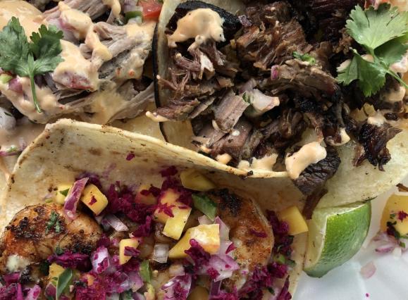 three street tacos with toppings