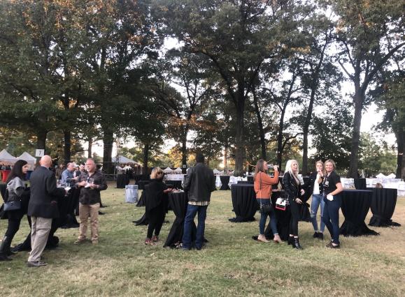crowd of people on grassy lawn at Botanic Garden