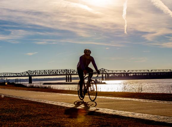 Biker along the riverfront | Craig Thompson