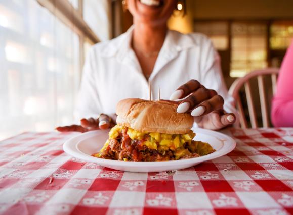 pulled pork sandwich with slaw on plate 