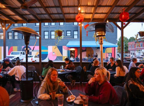 diner sit on patio of Good Fortune
