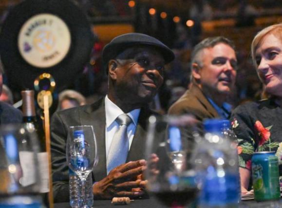booker t sitting at table for 2022 Memphis Music Hall of Fame Induction Ceremony