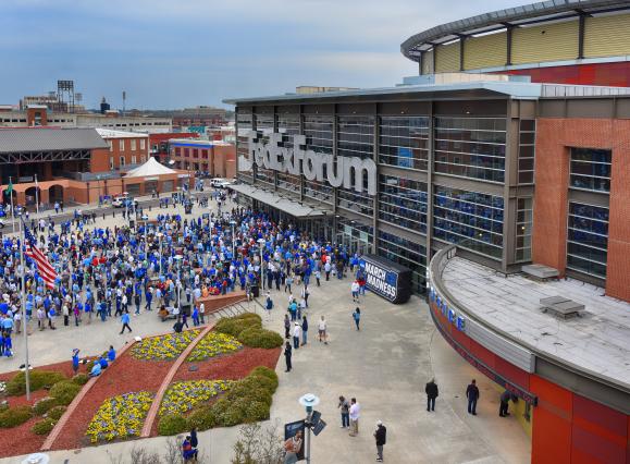 people file into Fedex forum from outside for march madness