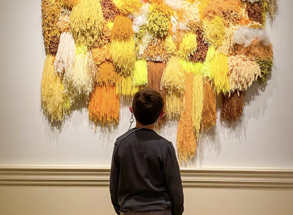 child looks at art in the Dixon gallery