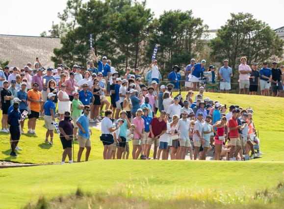 people watching golfers during FedEx St. Jude Golf Tournament