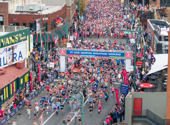 aerial photo of runners at the start of St. Jude Marathon