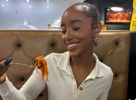 Carmen with Cafe India food