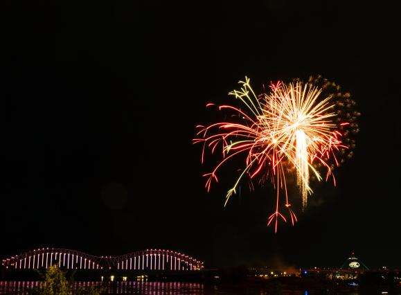 fireworks over bridge and skyline in downtown memphis