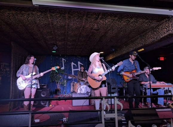 band performs on stage at Hernando's Hideaway
