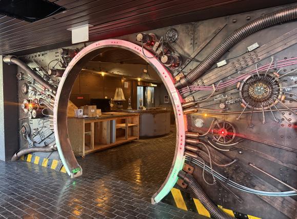 entrance to BVO with metal futuristic design covering walls