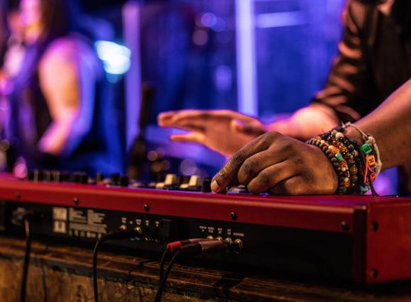 hands close up playing keyboard