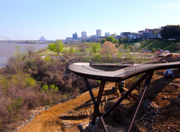 aerial image of Memphis Flyway walkway being constructed with Memphis skyline background