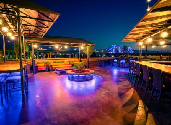 pyramid rooftop patio with fire pits and seating
