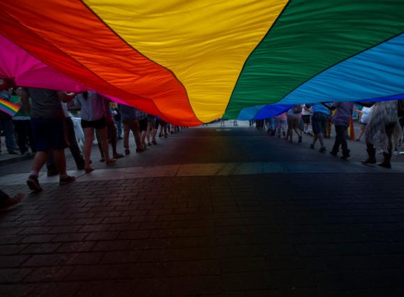 Pride-Parade-Massive-Flag-Under-1024x682.jpg