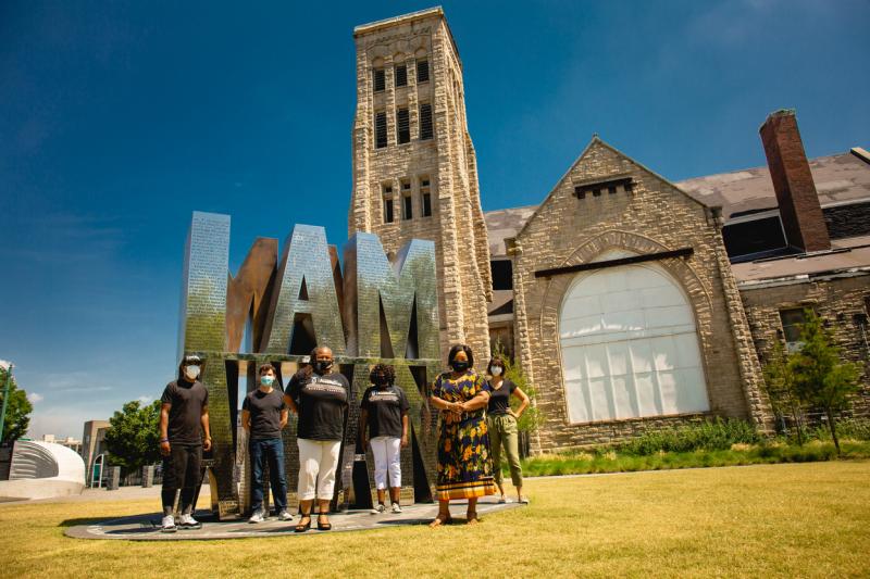 tour group standing in from of Clayborn Temple and I AM A MAN Plaza