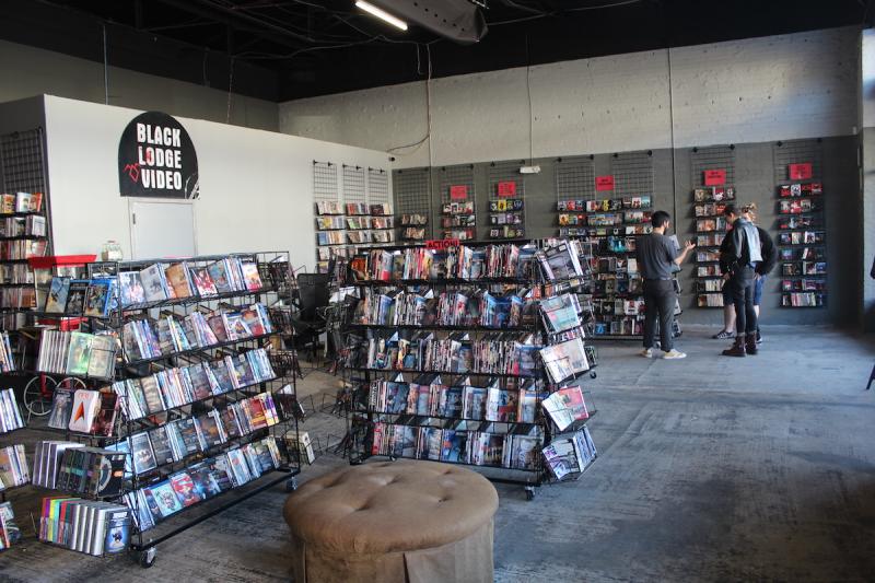 shelves of DVDs for rent at Black Lodge video