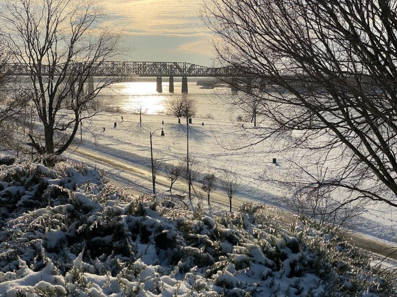 snowfall on the bluff in Memphis with Harahan Bridge in background