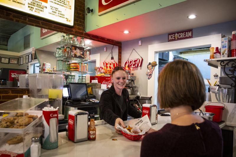 Customer being served at Dyers Hamburgers on Beale Street