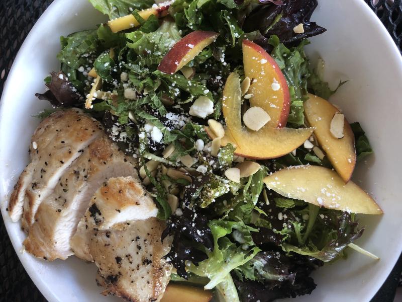 salad with chicken and peach slices