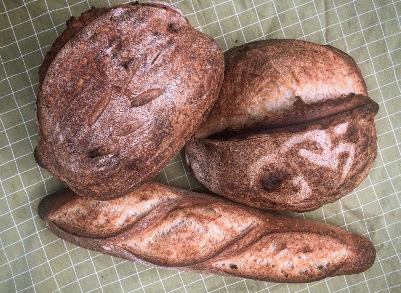three loaves of homemade bread
