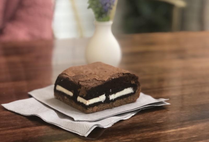 brownie stuffed with an oreo with cookie and cream filling visible