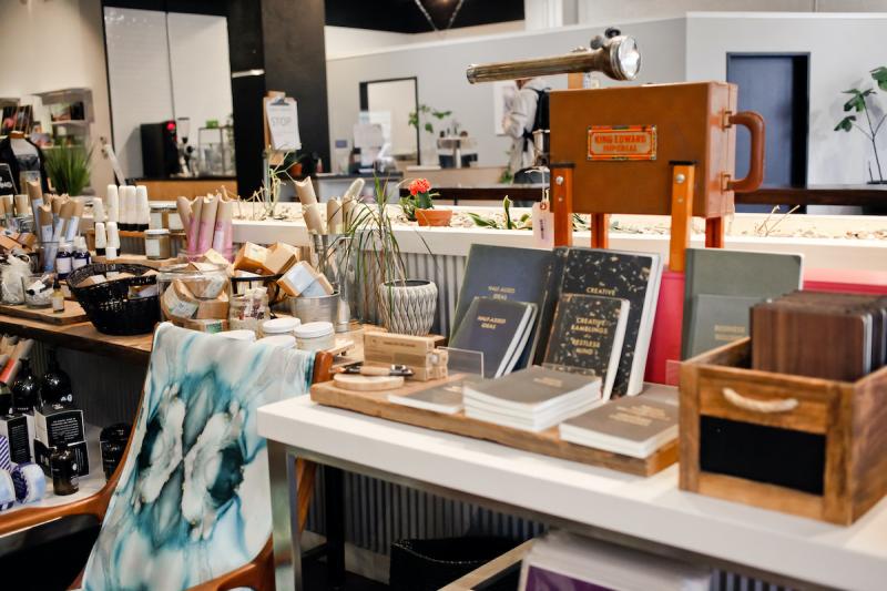 store shelf with notebooks, soap, and gifts