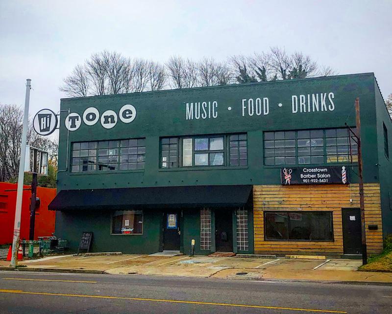 hi tone building, dark green facade with hi tone logo and the words music, food, drinks