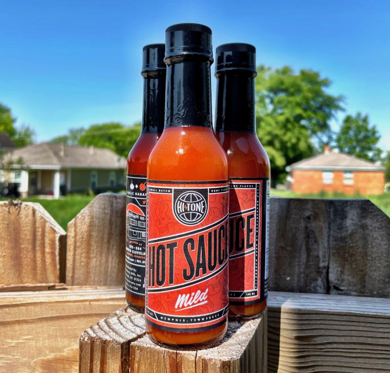 three bottles of Hi Tone branded hot sauce