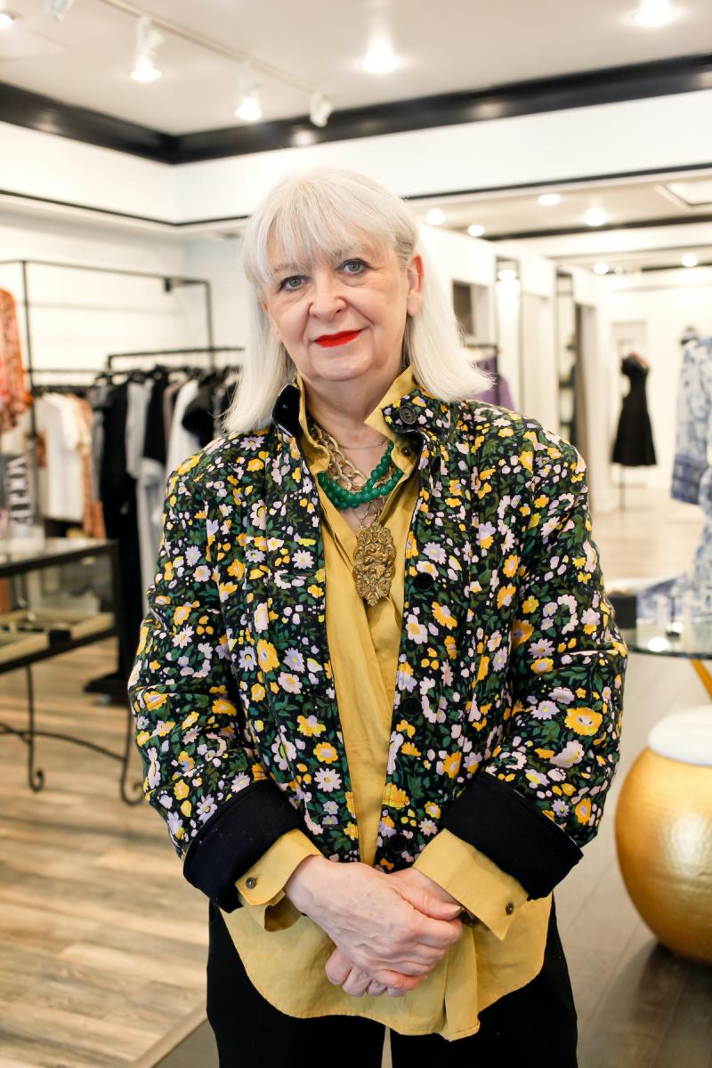 owner of Kittie Kyle boutique in her shop
