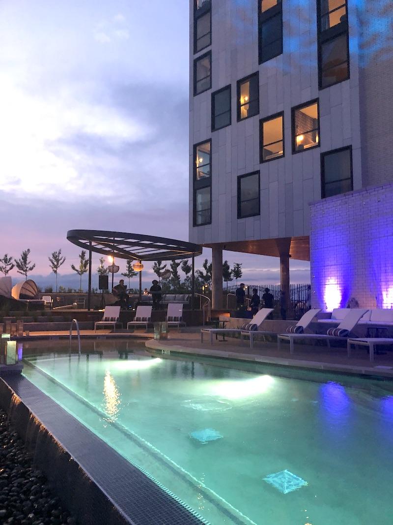 Hyatt Centric hotel pool, blue-green pool and blue lights on the wall