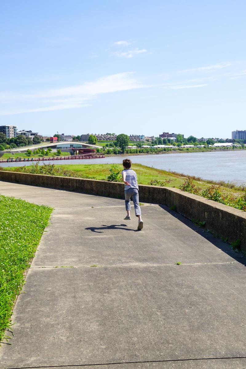 Kid Running by River