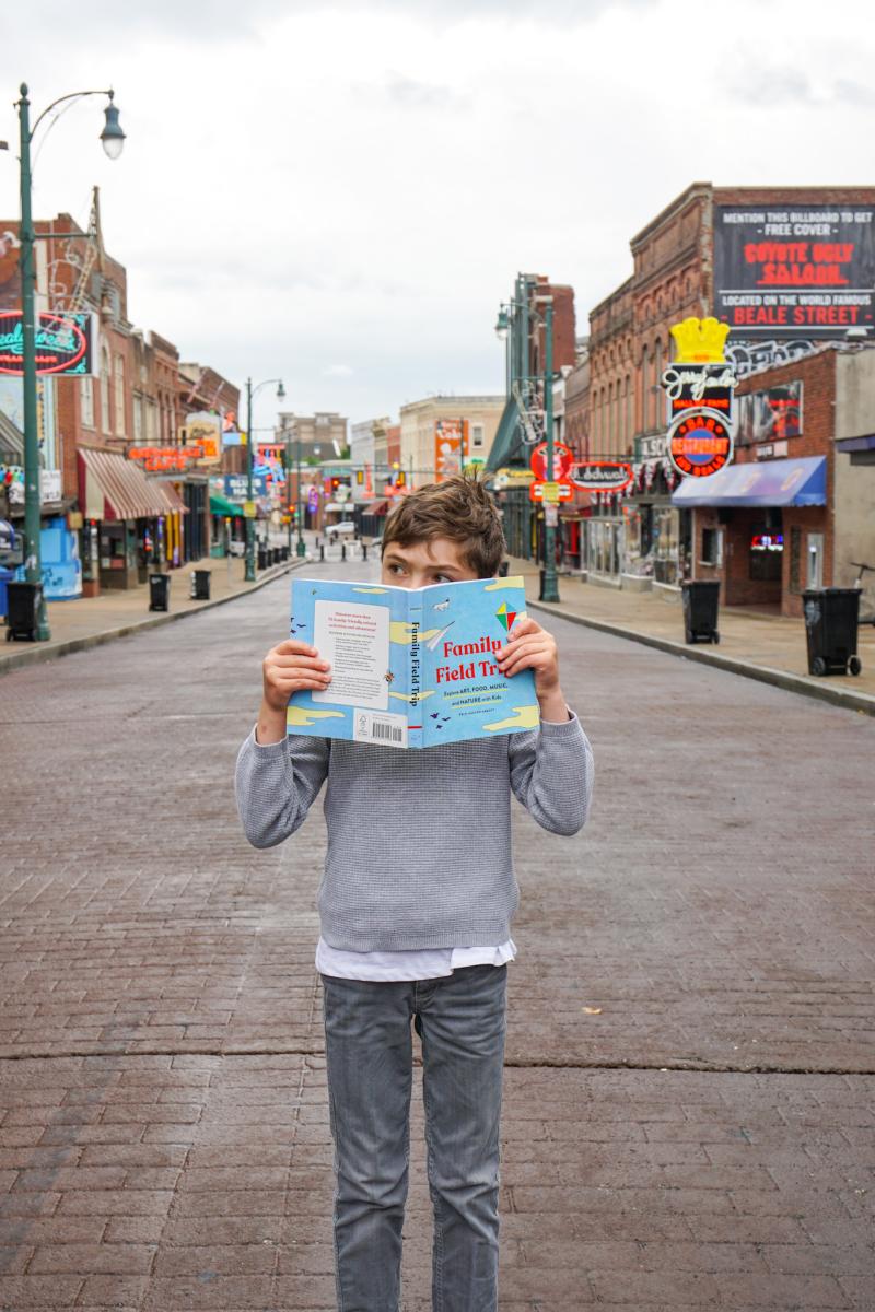Kid w/ Book on Beale