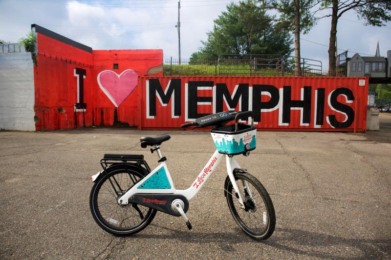 red I love Memphis mural with a bicycle in front of it
