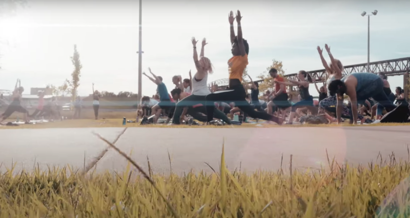 people doing yoga outside