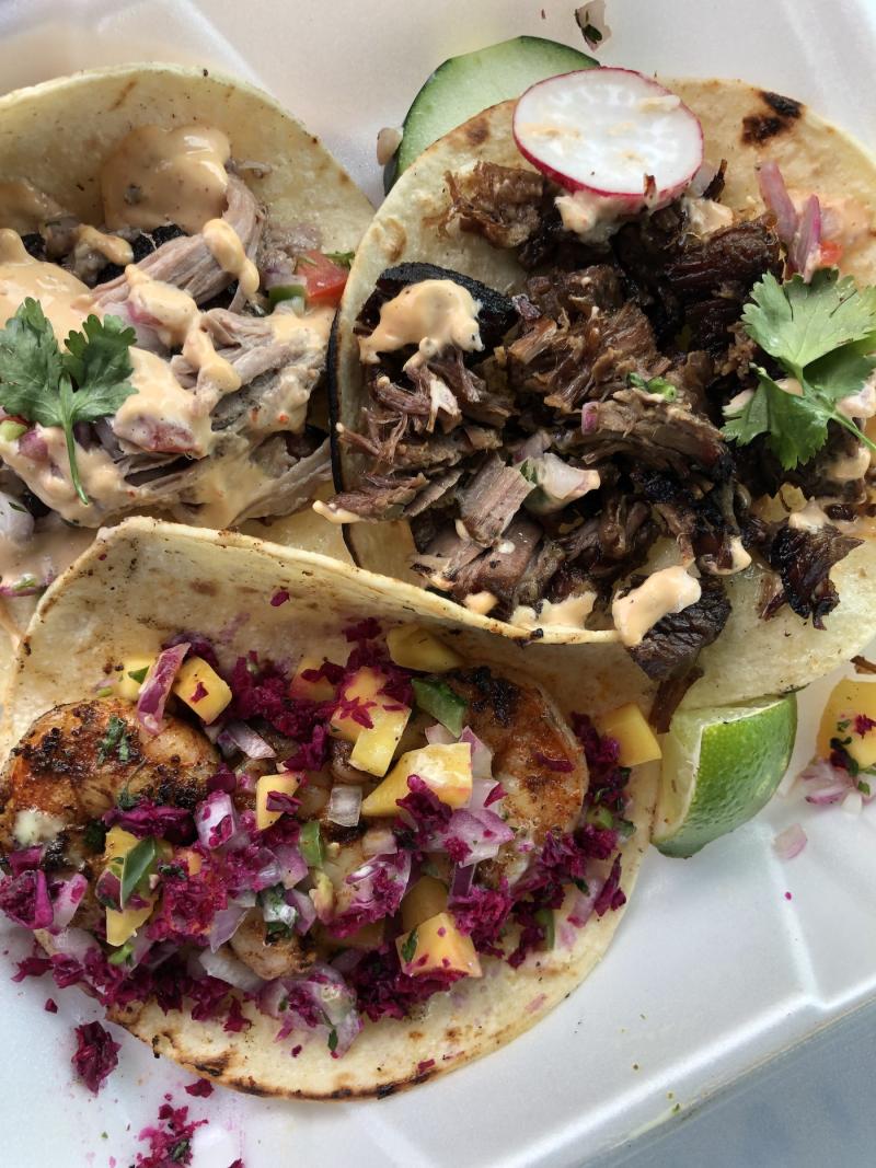 three street tacos with toppings