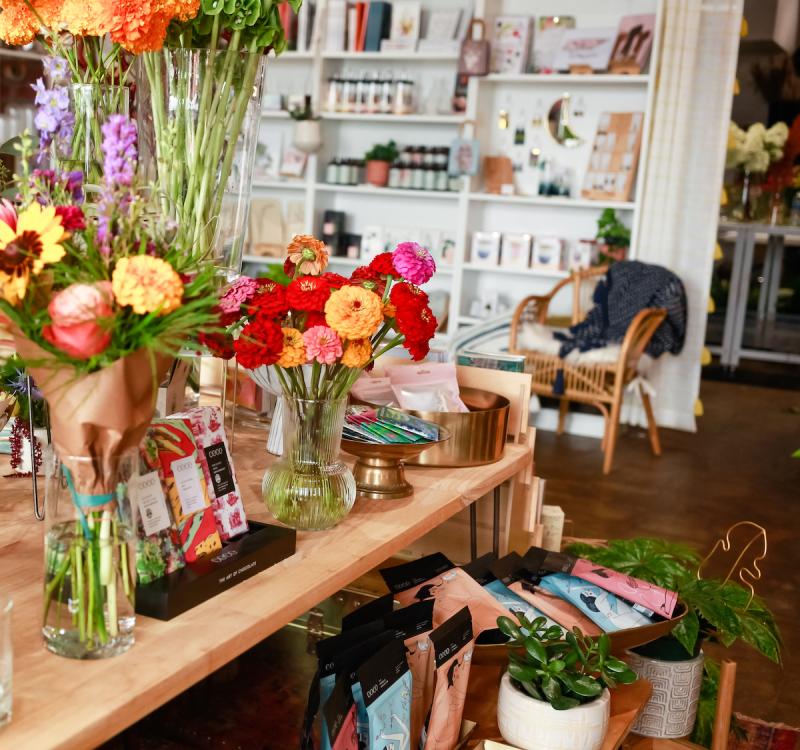plant gift shop interior with red and orange flowers