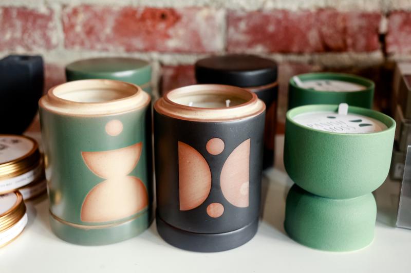 candles in colorful vessels