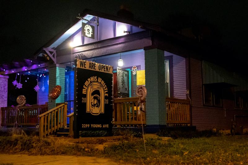 Memphis Whistle building - purple home with skull sign out front