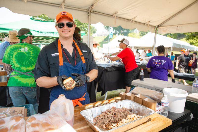 Chef preparing barbecue at the World Championship Barbecue Cooking Contest.