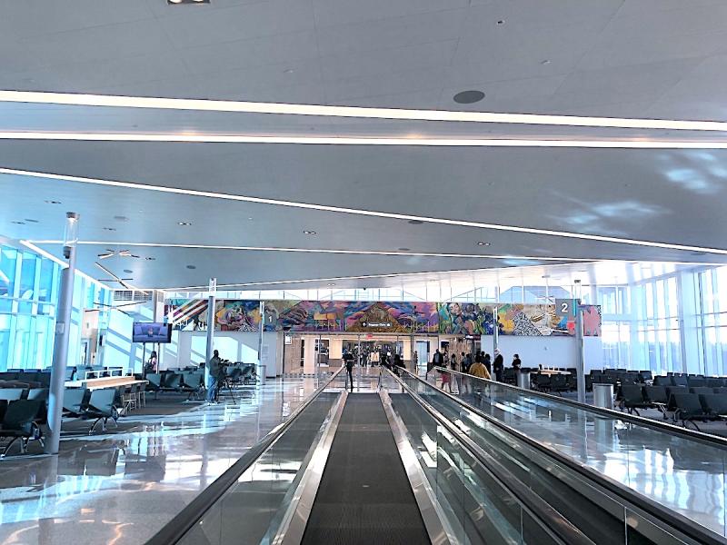 airport concourse with people mover conveyor