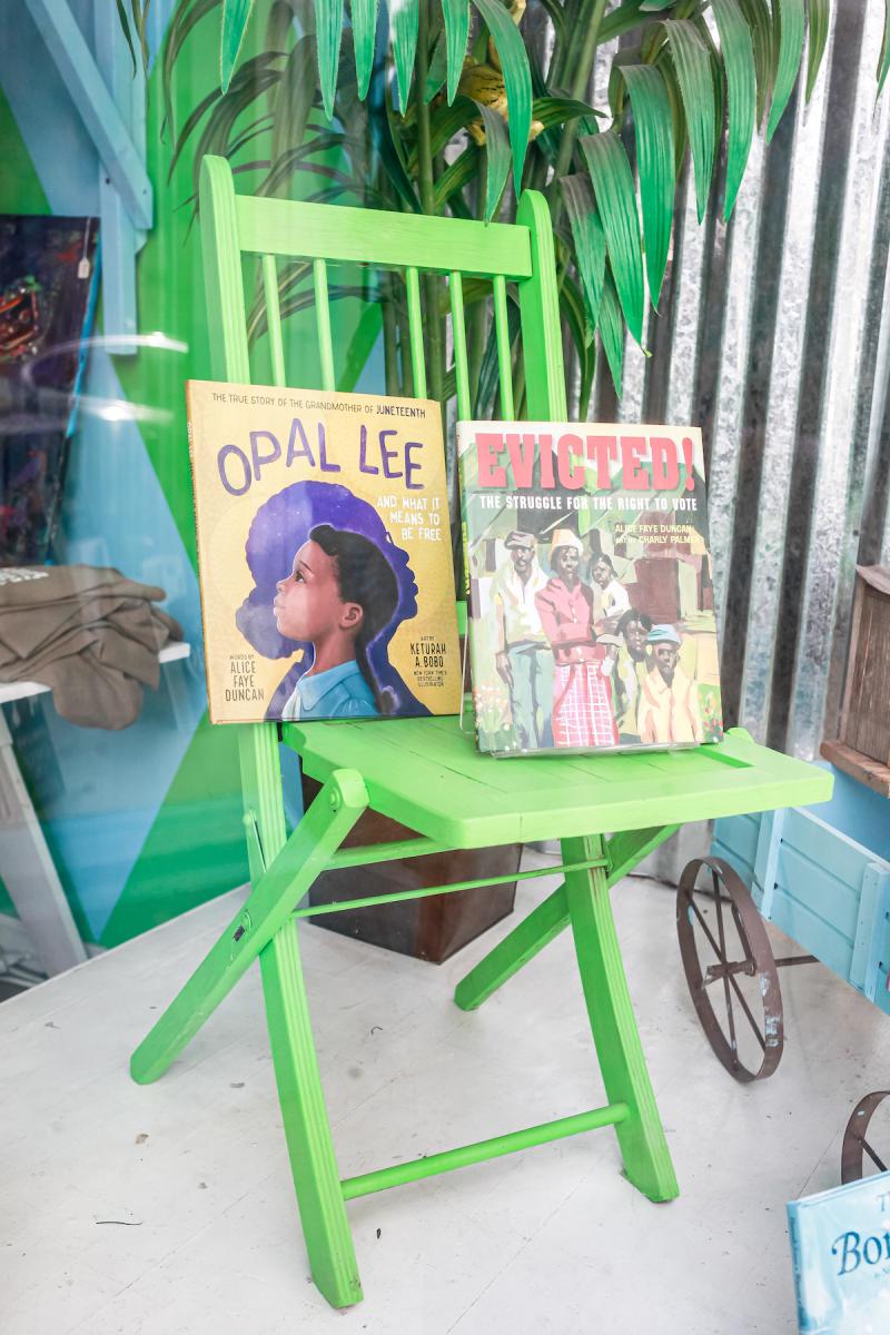 two books on green chair