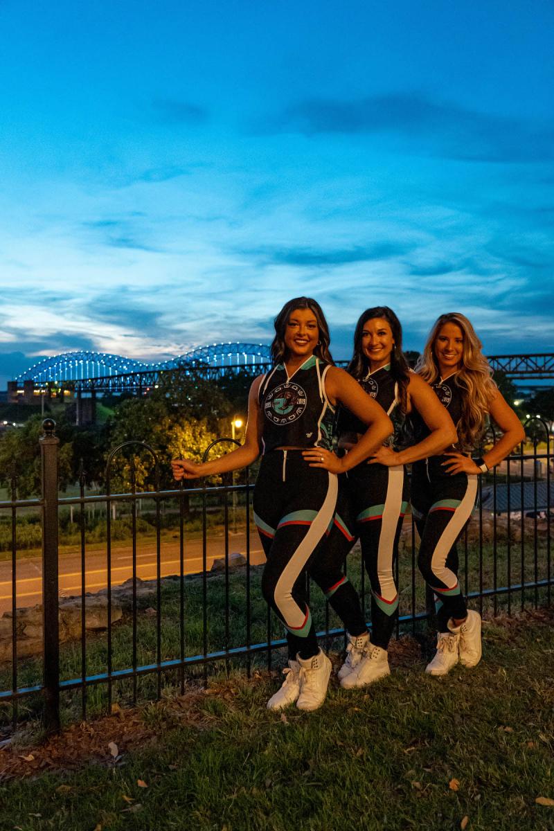 grizz girls at watch party with. bridge