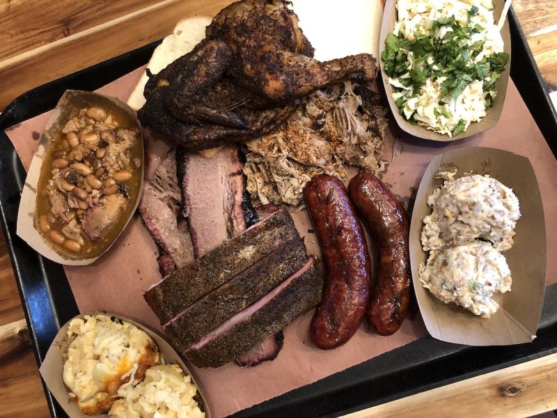 platter of bbq sausage ribs brisket